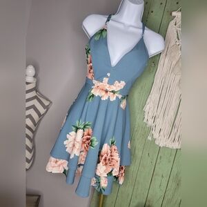 Small Emerald Sundae Elegant blue halter dress  floral design and lace back.